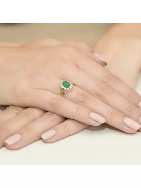 Ring In 14kt Gold with Emerald of 0.80 ct and 10 Diamonds 0.30 ct